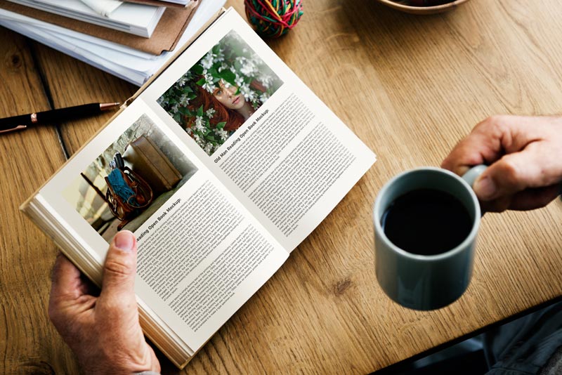 Free Man Reading Open Book Mockup