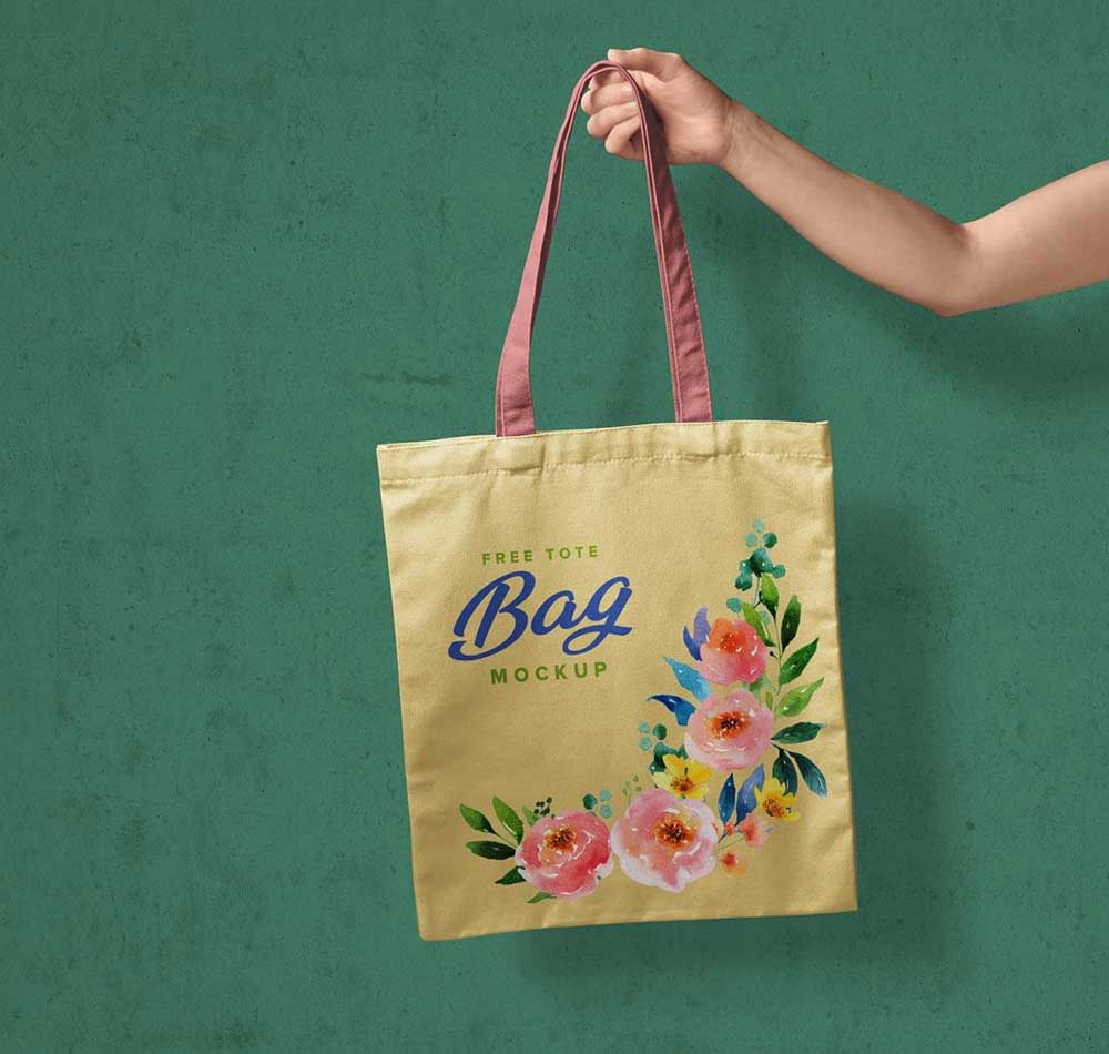 Download Free Hand Holding Tote Bag Mockup | Mockuptree