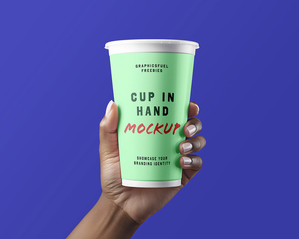 Free Hand Coffee Cup Mockup